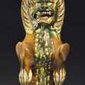 A sancai-glazed pottery figure of an earth spirit, Tang dynasty (AD 618-907)