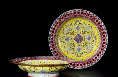 A Fine and Exceptionally Rare Pair of Yellow-Ground Famille Rose Pierced Rim Dishes, Qianlong Period (1736-1795)