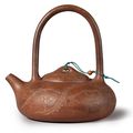 An Yixing 'prunus' teapot and cover, signed Yun Lin, Qing dynasty, 19th century