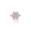 A rare 12.30 carats rectangular-cut fancy intense orangy-pink diamond ring. 