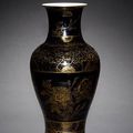 Mirror-black glazed & mirror-black and gilt vases, Kangxi & Qianlong six-character marks 