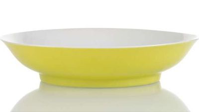 A fine and very rare imperial lemon yellow-glazed porcelain saucer,  underglaze-blue Yongzheng six-character mark and of the per