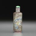 An enameled porcelain 'dragon' snuff bottle, Jingdezhen kilns, 1800-1860 
