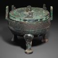 A bronze ritual tripod food vessel and cover, Ding, Spring and Autumn period, 6th century BC