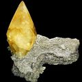 Golden Calcite atop matrix