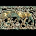 An archaic gilt-bronze openwork 'Two deers' plaque, Ordos, circa 2nd-1st century BC