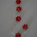 mes créations fimo...pendentif 5 mini fleurs rouge