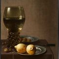 Floris van Schooten (1605 - Haarlem 1656), A Still-Life of a Röhmer, a plate of lemons, a dish of olives, nuts and a knife on a 