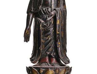 A gilt and red, lacquered wood figure of Buddah Shakyamuni, Vietnam, 18th-19th ct