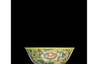 A finely enamelled famille-rose yellow-ground 'floral' bowl. Seal mark and period of Jiaqing 