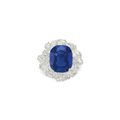A 13.37 carats Kashmir cushion mixed-cut sapphire and diamond ring
