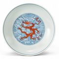 An iron-red and underglaze blue 'Dragon' dish, Daoguang seal mark and period(1821-1850)