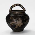 A russet-painted blackishbrown-glazed jar with rope-twist handle, Northern Song-Jin dynasty (960-1234)