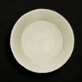 A finely incised Dingyao 'chilong' dish, Northern Song dynasty