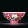 A ruby-ground famille-rose 'Floral' bowl, seal mark and period of Qianlong (1736-1795)