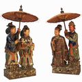 Pair of Chinese 19th century glazed pottery figures of an aristocratic couple and their attendents