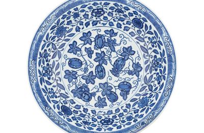 A large blue and white 'melon vines' charger, Yongzheng mark and period (1723-1735)