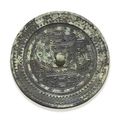 A bronze circular 'TLV' mirror with inscription, Xin-Early Eastern Han dynasty, 1st century