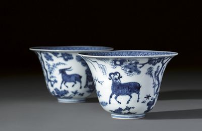An extremely rare pair of blue and white 'Three ram' bowls, marks and period of Jiajing (1522-1566)