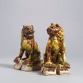 A rare pair of sancai-glazed pottery lions, Tang dynasty (618-907)