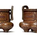 A rare pair of gold-splashed bronze censers with Arabic inscriptions, 18th century