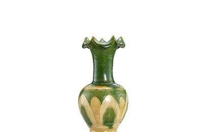 A sancai-glazed foliate-rim vase & A green-glazed phoenix-head vessel, Liao dynasty