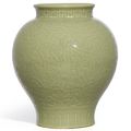 A fine and rare celadon-glazed 'Kui Dragon' jar, Seal mark and period of Qianlong