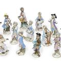 Fifteen Meissen monkey-band figures, 19th century, blue crossed swords marks, incised numerals and pressnummern