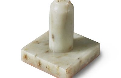 A white jade seal, Qing dynasty, dated Jiaqing yichou, corresponding to 1805