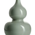 A fine imperial celadon-glazed double-gourd vase, China, underglaze blue Qianlong seal mark and period