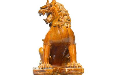 An amber-glazed figure of a lion, Tang dynasty
