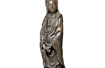 An inscribed bronze figure of Guanyin, Qing dynasty, 17th - 18th century