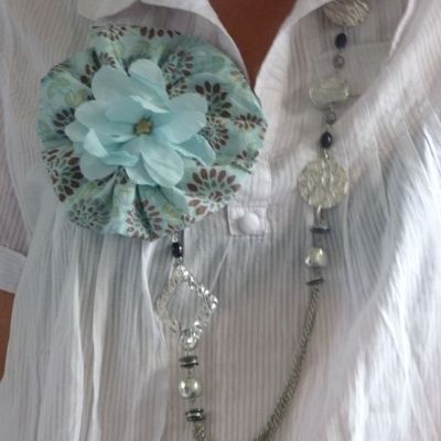 Broche fleur voyageuse