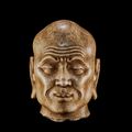 A carved stone head of Luohan, Liao dynasty (916-1125)