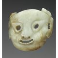 Masque figurant une tête de jaguar en jade. Chine, dynastie Zhou occidentaux, 1027¬770 avant J.-C.  