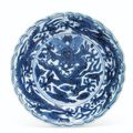 A blue and white 'dragon' dish, Wanli six-character mark in underglaze blue within a double circle and of the period (1573-1619)