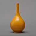 A Yellow-Glazed Incised Bottle Vase, Qianlong Mark And Period