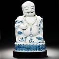 A blue and white figure of Budai. Early 17th century