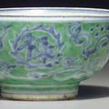 An unusual green-glazed blue and white bowl, Chongzhen two-character mark in iron-red and of the period (1628-1644)