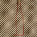 Titre "La Bouteille" support tissus avec motifs, collage d'une moitié de bouchon en liège trait à la peinture rouge. 