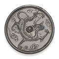 A bronze circular mirror with coiled dragon. Tang dynasty (618-907)