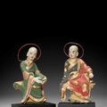 A pair of polychrome and gilt-decorated stucco figures of luohan, Yuan-Ming dynasty, 14th-15th century