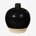 A Chinese 'Henan' black glazed ovoid jar, Jin dynasty (1115–1234)