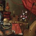 School of Madrid, circa 1650, a vanitas still life with a skull, a violin, a pewter plate, a vase of flowers, a book and...