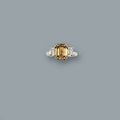 A cut-cornered step-cut diamond of golden-brown hue, weighing 4.30 carats ring 