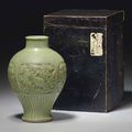 A rare Longquan celadon carved meiping, Yuan dynasty (1279-1368)