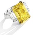 Important and Fine Fancy Vivid Yellow Diamond and Diamond Ring