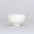 A fine and very rare white-glazed anhua-decorated ‘dragon’ bowl, Kangxi slip-decorated seal mark and of the period