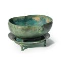 A rare set of bronze water vessel and stand, yi, Spring and Autumn Period (770-475 BC)
