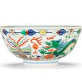 A wucai 'dragon and phoenix' bowl, Daoguang seal mark and of the period (1821-1850)